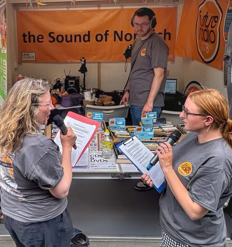 Councillor Claire Kidman with Station Manager Dean and Norwich Today Presenter Sarah at Future Radios Market Stall 2025 768x817