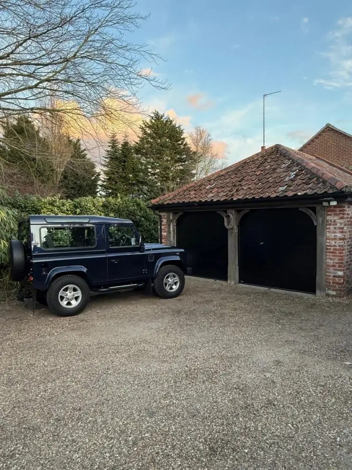 sectional garage doors norwich Black e1767485032185